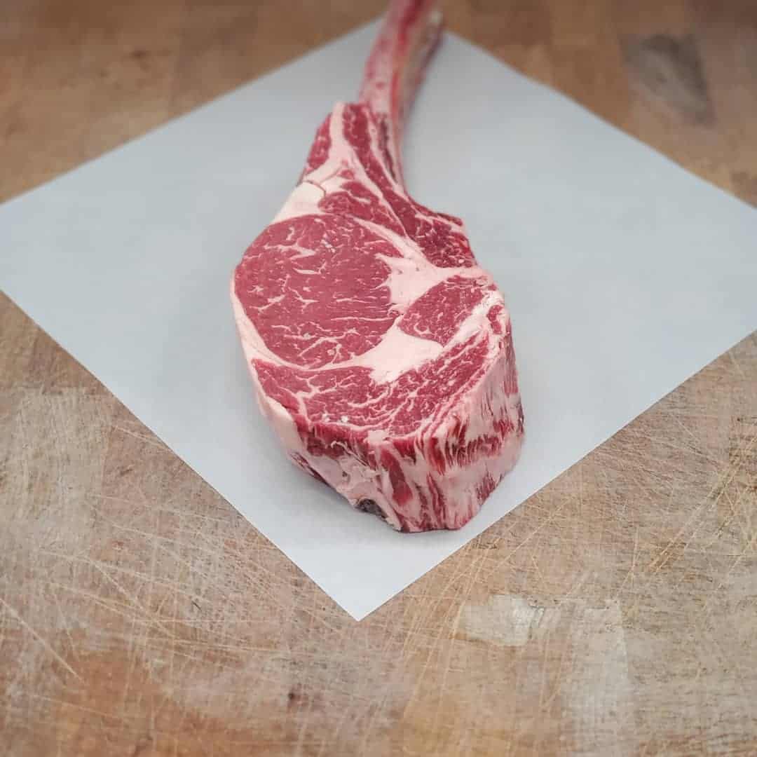 raw beef ribeye on butcher paper